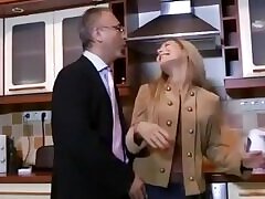 Hot blonde babe undresses while an old man watches